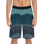 Man wearing SparkyCA wave-print board shorts, front view from the waist down