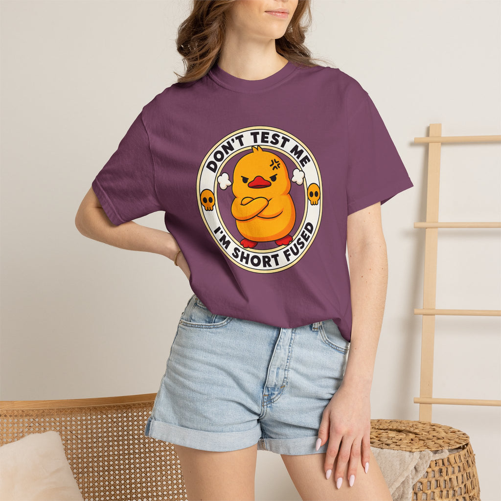 Woman wearing the Dont Test Me Duck Tee in Berry, close-up front view