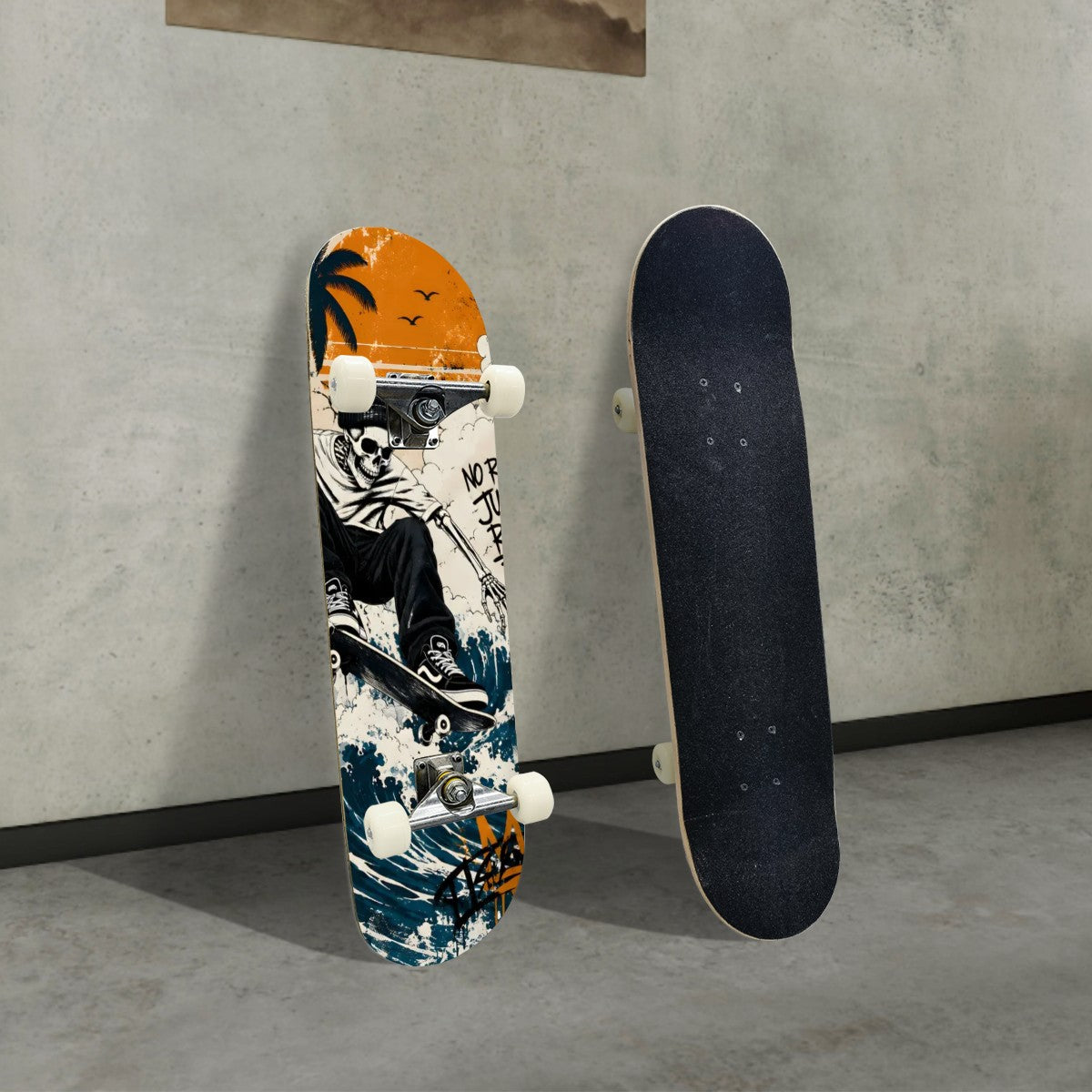 Two skateboards leaning against a wall, showing graphic deck and black grip tape sides