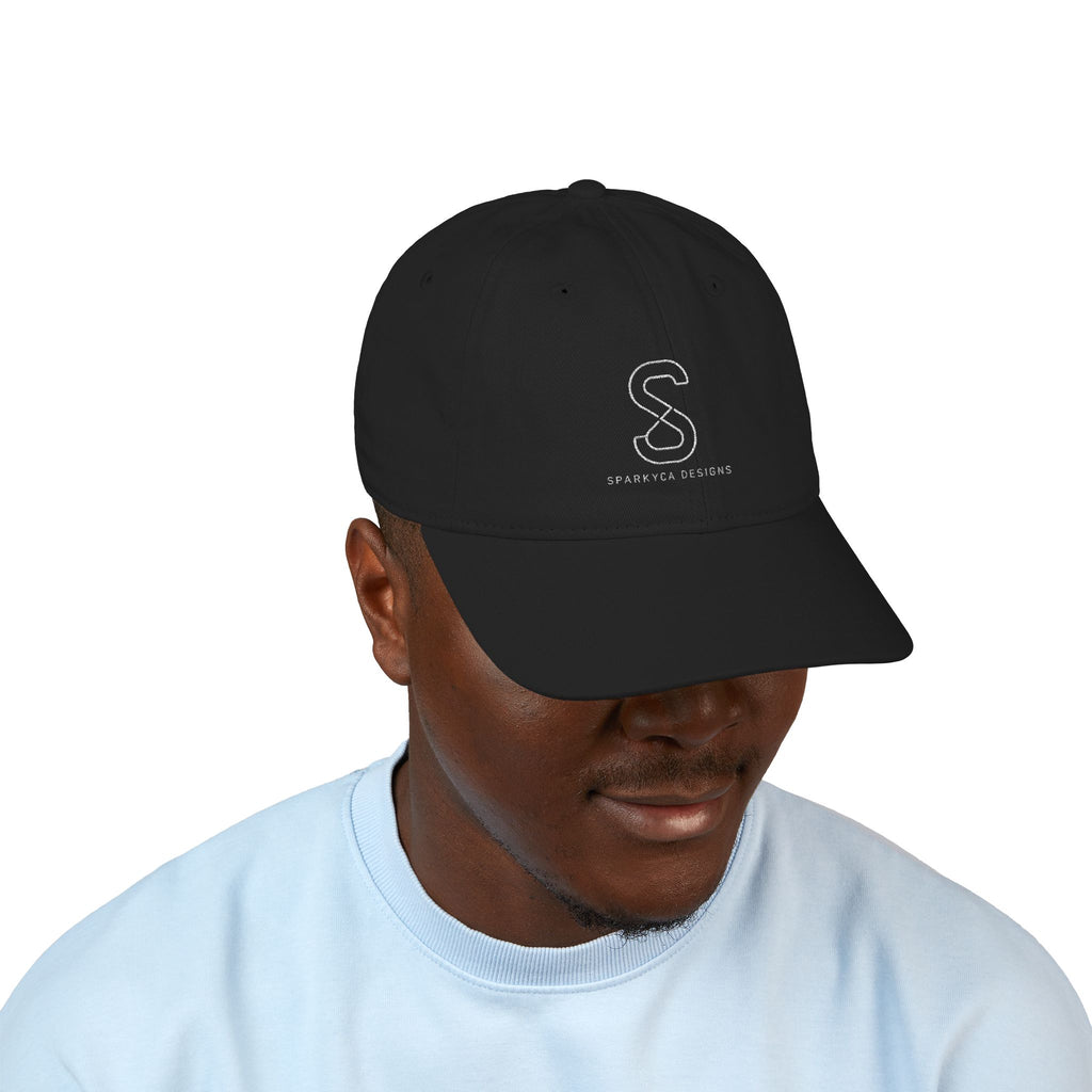 Man wearing the Organic Embroidered Baseball Cap in Black, studio photo