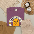 Dont Test Me Duck Tee in Berry — styled flat lay with props