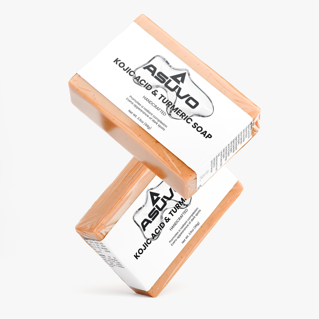 Two wrapped bars of ASUVO Kojic Acid & Turmeric Soap stacked at an angle