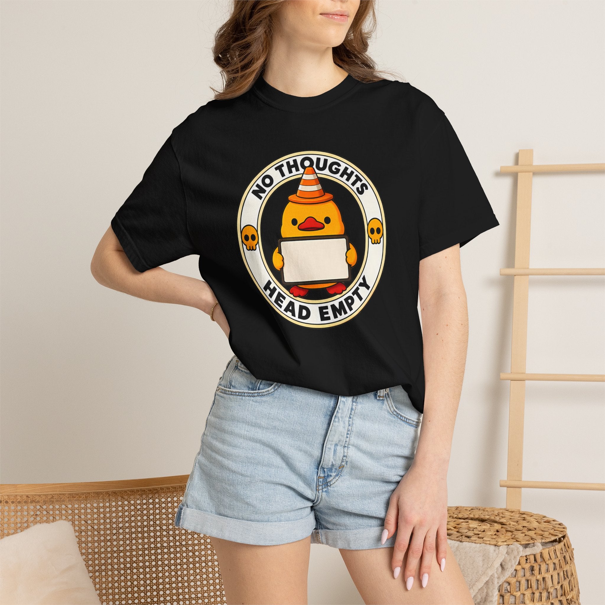 Woman wearing the No Thoughts Head Empty Duck Tee in Black, standing lifestyle photo