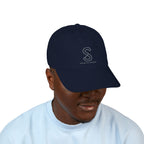 Man wearing the Organic Embroidered Baseball Cap in Pacific navy, studio photo