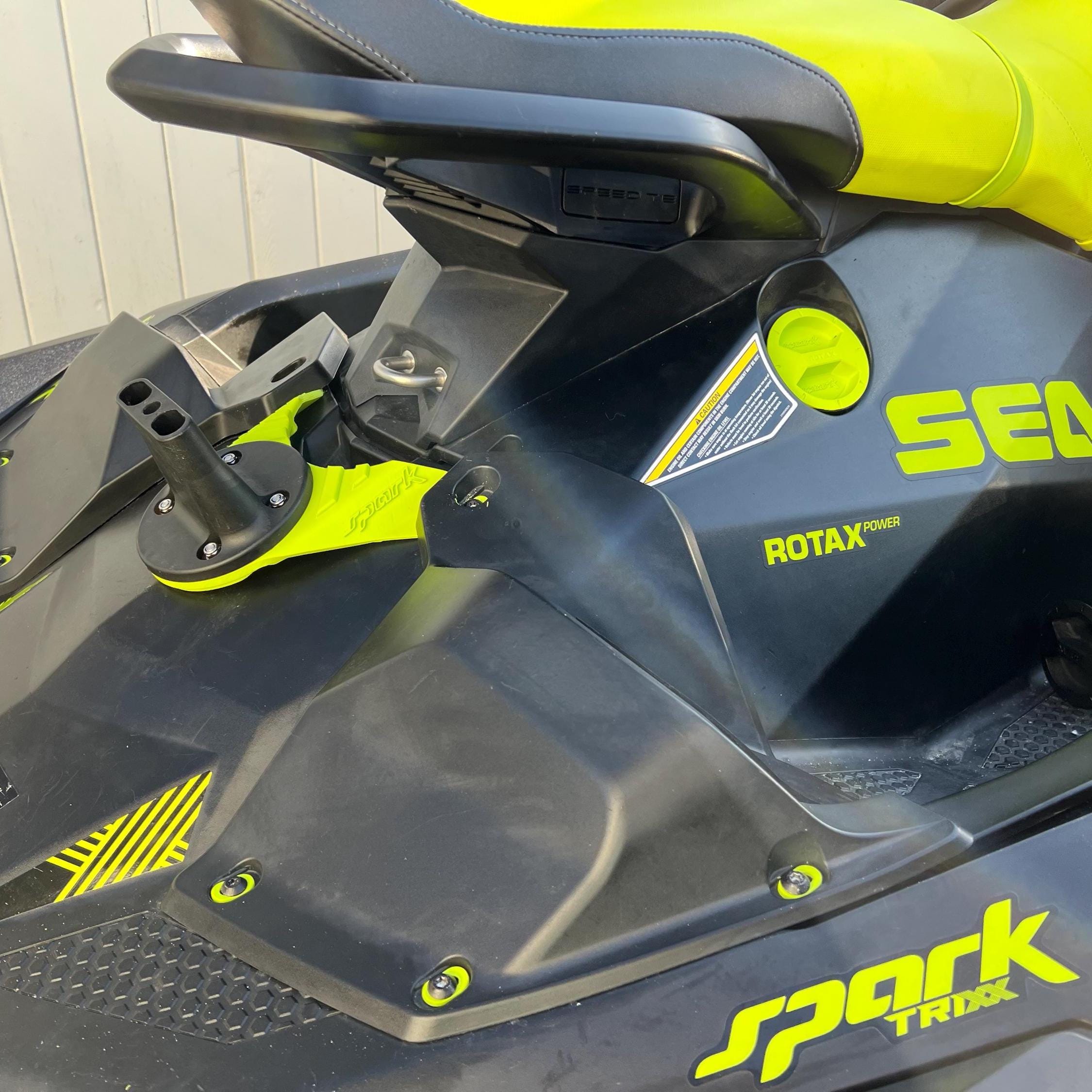 Yellow flagpole mount bolted to a Sea-Doo Spark Trixx rear deck