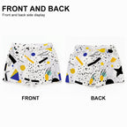 Front and back view of white geometric-print beach shorts laid flat