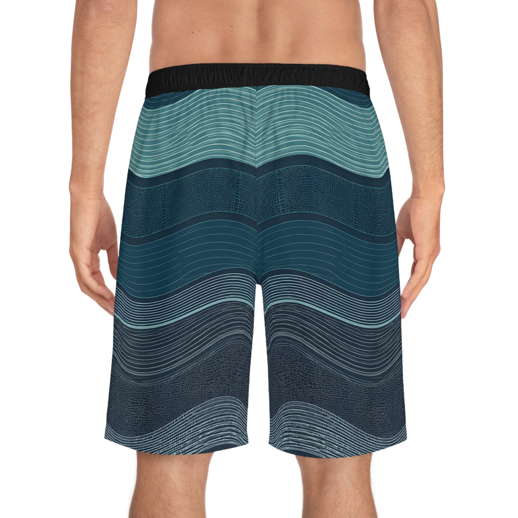 Man wearing SparkyCA wave-print board shorts, back view from the waist down