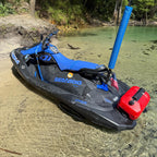 Sea-Doo Spark on a shallow beach shoreline, flag pole and mount visible at the rear next to the red fuel can