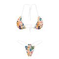 White-trim bikini set with colorful patchwork print, laid flat, top and bottom