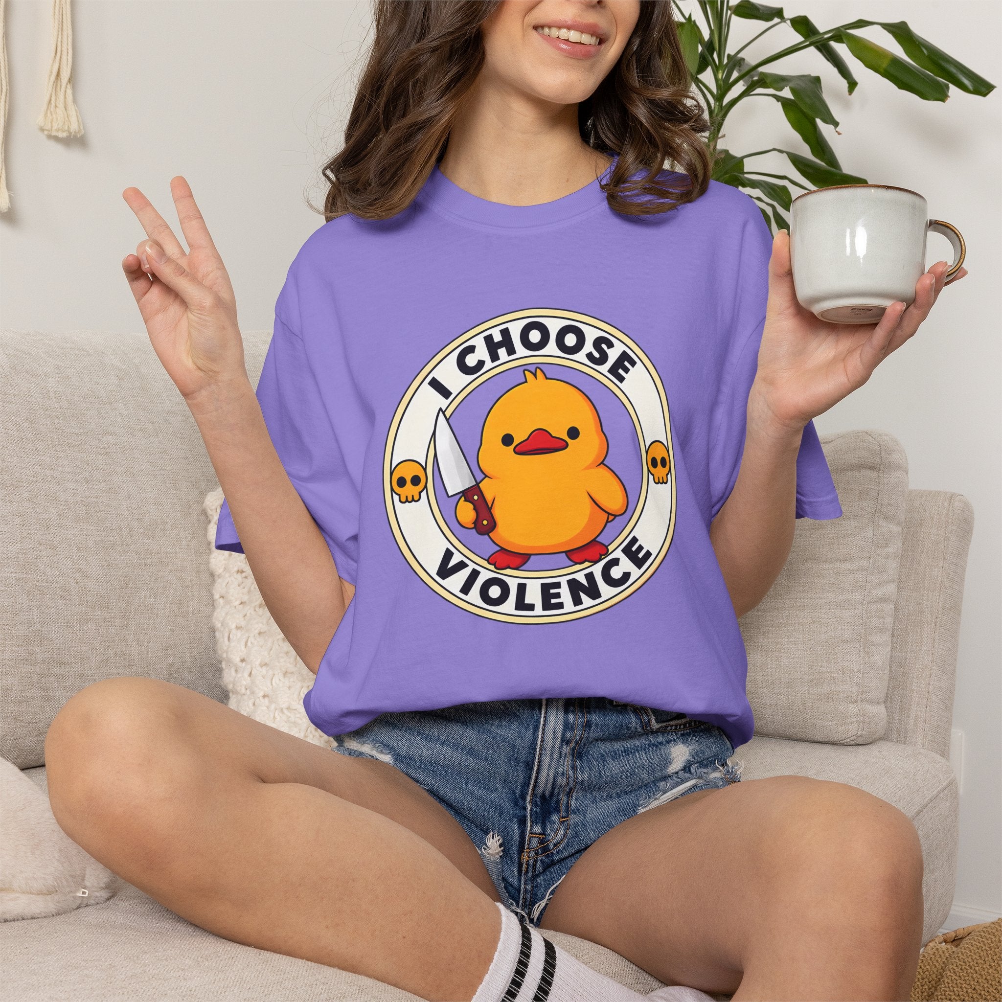 Woman wearing the I Choose Violence Duck Tee in Violet, lifestyle photo