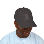 Man wearing the Organic Embroidered Baseball Cap in Charcoal, studio photo
