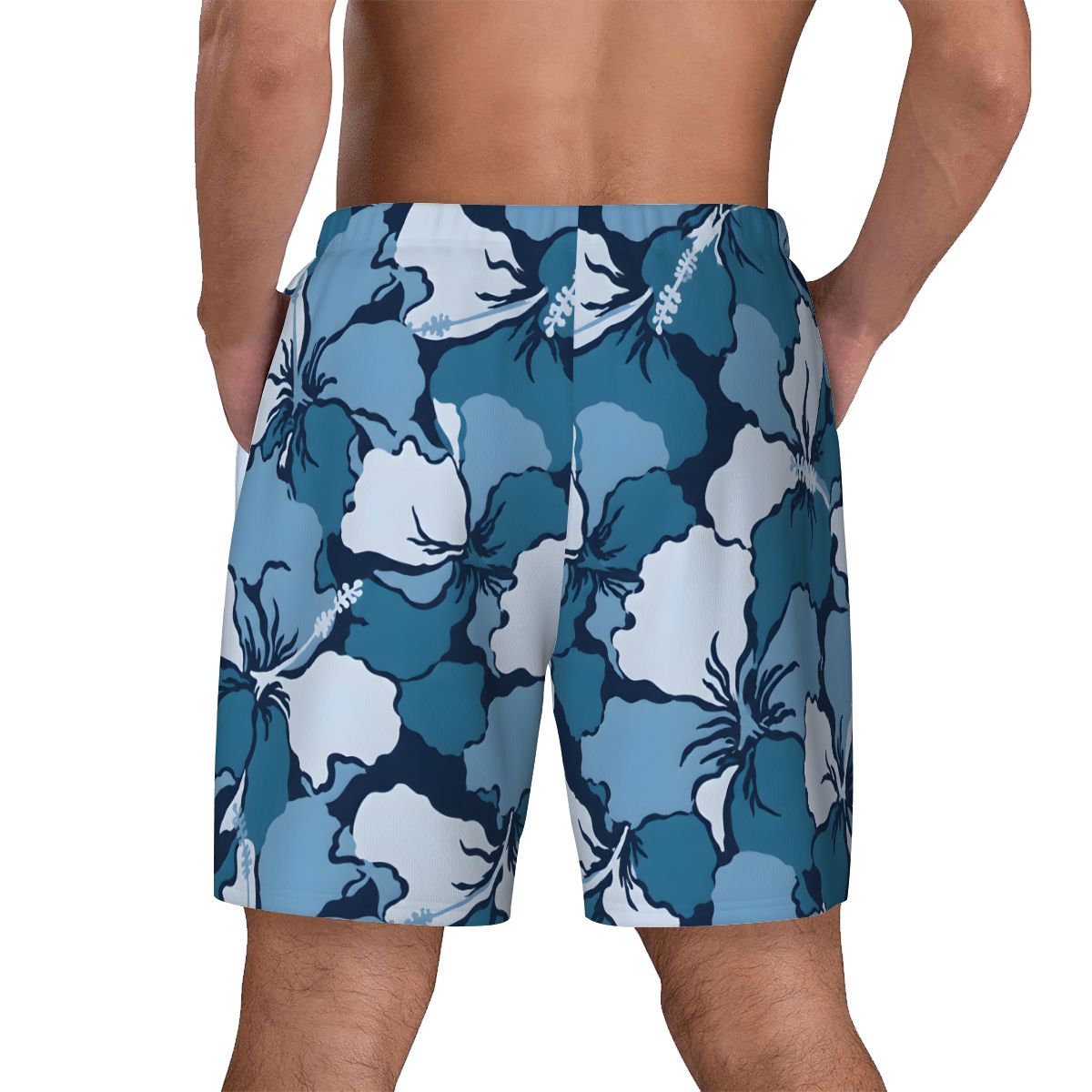 Blue and white hibiscus print swim shorts, back view on model