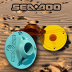 Bronze, teal, and yellow Sea-Doo Insta360 pole mounts grouped together on sand