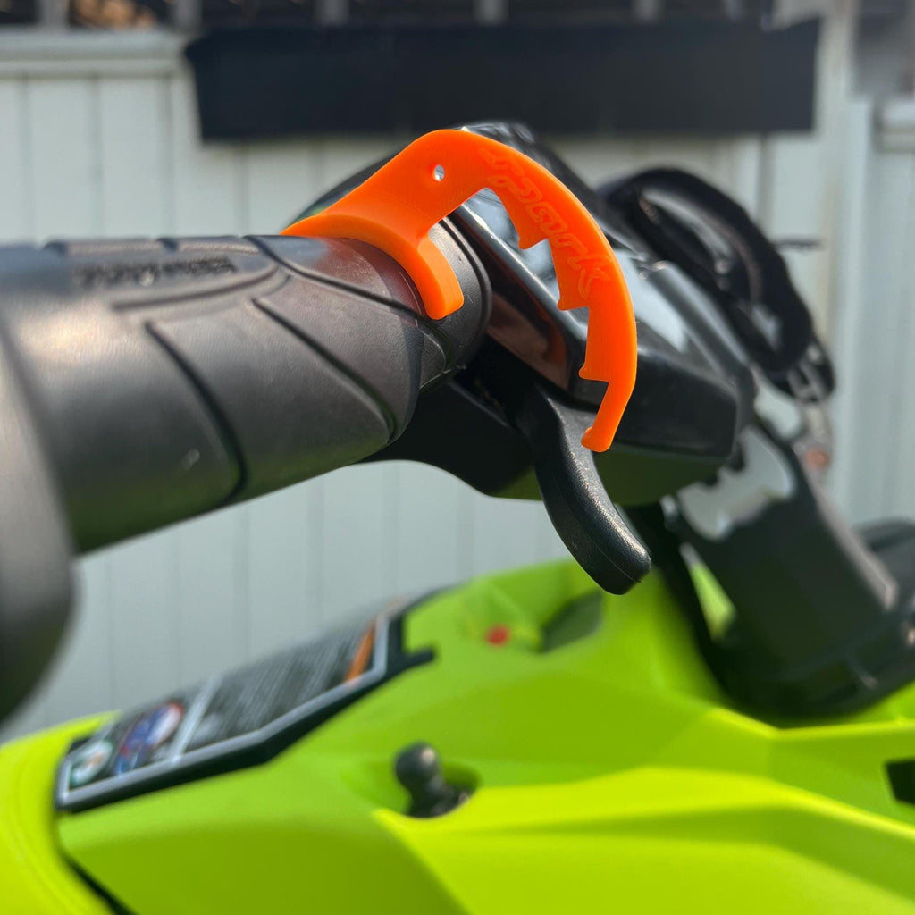 Orange Spark cruise control lever installed, close-up view