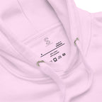 Close-up of the Lavender hoodie's inner neck label showing the SparkyCA Designs logo, size, and made-in-Pakistan fabric tag